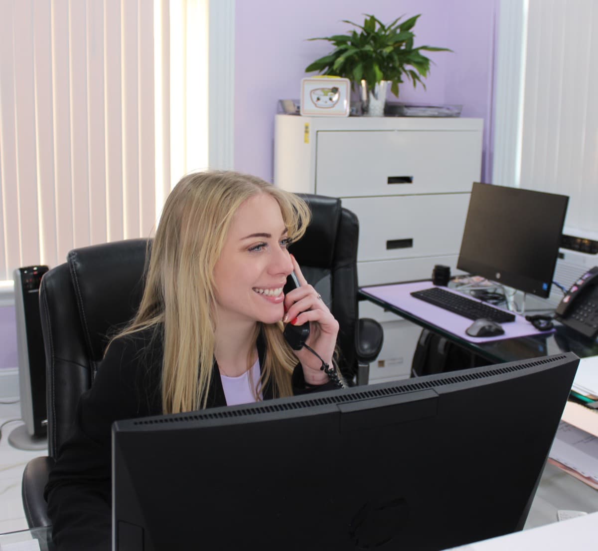 Receptionist helping patients